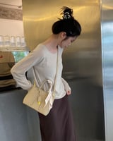 ‎ شنطة نسائية من الجلد بلون بيج