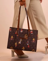 ‎ شنطة نسائية بتصميم عصري بلون بني