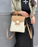 ‎ شنطة ظهر جلد باللون البني والبيج