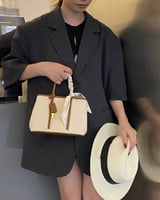 ‎ شنطة نسائية من الجلد بلون بني و بيج | MLH021F440...