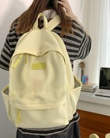 ‎ شنطة ظهر للجنسين بلون أصفر