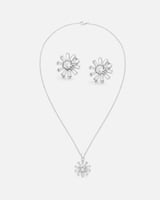 ‎ طقم نسائي ملفت باللون الفضي