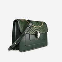 ‎ شنطة زايروس النسائية من الجلد الناعم باللون الأخ...