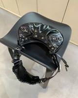 ‎ شنطة نسائية أنيقة بلون أسود