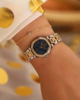 ‎ ساعة نسائيه ايمزوري ستيل بلون فضي وذهبي | EOS018...