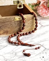 ‎ سبحة رجالة بالون البني