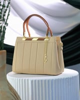 ‎ شنطة نسائية من ايمزوري بلون بيج