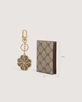 ‎ محفظة وميدالية نسائية زايروس من الجلد بلون بني