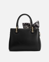 ‎ شنطة نسائية بتصميم مميز بلون أسود