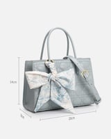 ‎ شنطة نسائية باللون الأزرق الفاتح