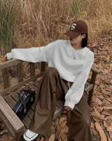 ‎ هودي نسائي بتصميم أنيق بلون أبيض