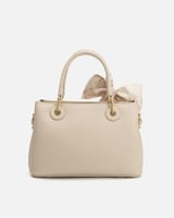 ‎ شنطة نسائية بتصميم مميز بلون بيج