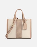 شنطة نسائية مميزة باللون البيج