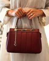 ‎ شنطة نسائية من ايمزوري بلون عودي