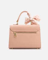 ‎ شنطة نسائية من الفي بلون وردي