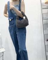 ‎ شنطة نسائية بلون أسود لامع