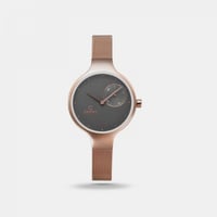 ‎ ساعة اوباكو النسائية بسوار شبكي باللون الروز قول...