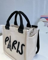 ‎ شنطة نسائية من القماش بلون بيج