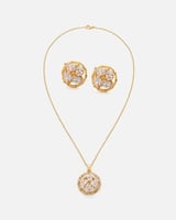 ‎ طقم نسائي أنيق باللون الذهبي