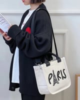 ‎ شنطة نسائية من القماش بلون بيج