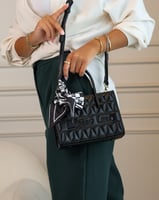 ‎ شنطة نسائية من الجلد بلون أسود | MLH063F0201