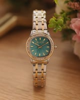 ‎ ساعة نسائيه إلڤي ستيل بلون فضي وذهبي | LOS063F06...