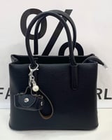 ‎ شنطة نسائية باللون الأسود