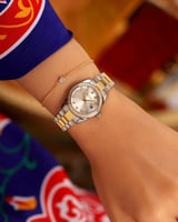 ‎ ساعة نسائيه إلڤي ستيل بلون فضي وذهبي | LOS062F06...