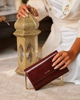 ‎ شنطة نسائية من الفي بلون عودي