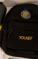 شنطة مدرسية بشعار النصر