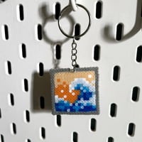 ميدالية مفاتيح | الموجة العظيمة