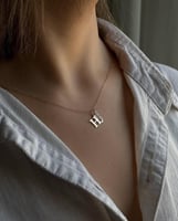 سلسال الحرف الناعم بتصميم فراشة