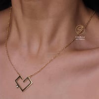 سلسال رقبه حرفين بشكل القلب - متجر سلطانة