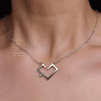 سلسال رقبه حرفين بشكل القلب - متجر سلطانة