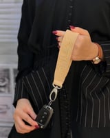 ميدالية مفاتيح جلد تطريز الاسم حسب الطلب