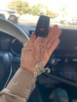 ميدالية مفاتيح رسمة الخيل