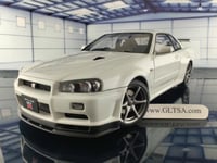 Nissan Skyline GT-R R34 White Pearl V-spec II 1:18...