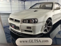 Nissan Skyline GT-R R34 White Pearl V-spec II 1:18...