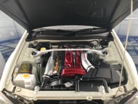 Nissan Skyline GT-R R34 White Pearl V-spec II 1:18...