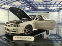 Nissan Skyline GT-R R34 White Pearl V-spec II 1:18...