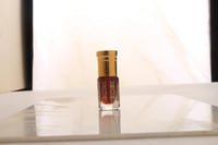 دهن عود تراد الحطب ربع تولة