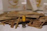 دهن عود تراد الحطب ربع تولة