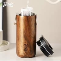 كوب بغطاء بتصميم خشبي من Binco