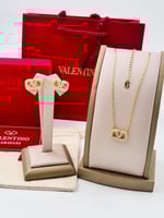 اكسسوارات نسائي سلسال وحلق من ماركه فالنتينو