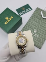 ساعات___ نسائي جديده من ماركات رولكس كلاسيك خامته...