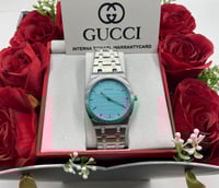 عروووووووض بكس هديه مع الورد جوتشي ساعه