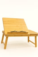 طاولة خشبية لقراءة الكتب