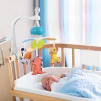 لعبة سرير الأطفال الموسيقية