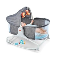 سرير اطفال هزاز مع العاب