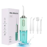 جهاز تنظيف الأسنان المائي